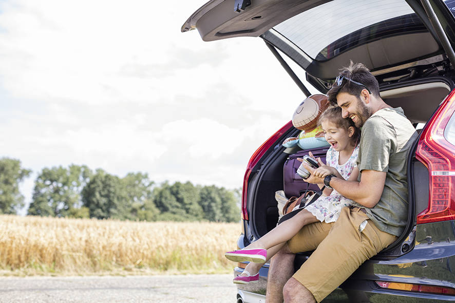 Father and daughter on a road trip