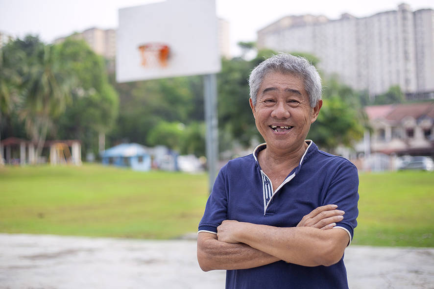 Man smiling with a missing tooth