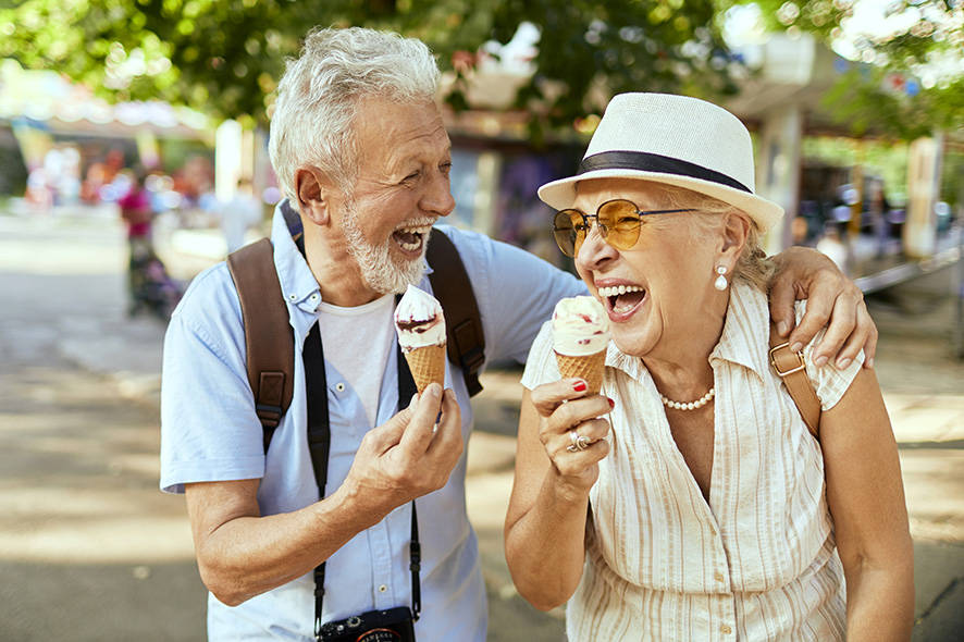 Older couple eating ice creams