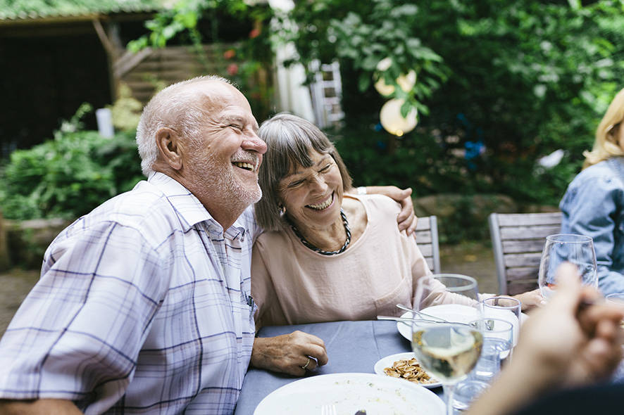 Older couple hugging