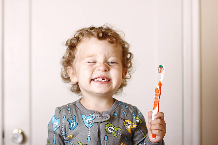 Little boy brushing teeth