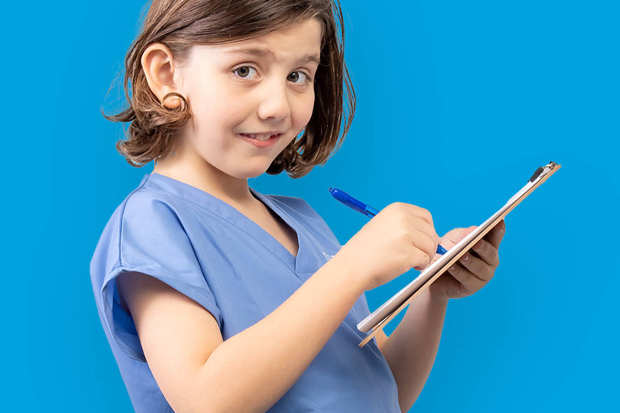 Boy holding a clipboard