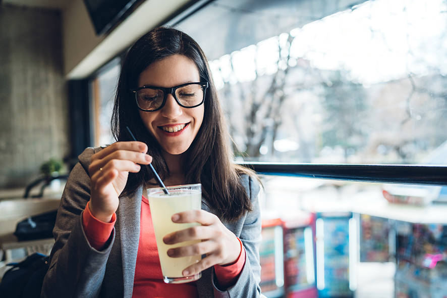Lady drinking soft drink