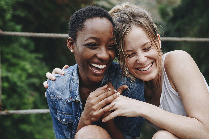 Two ladies smiling